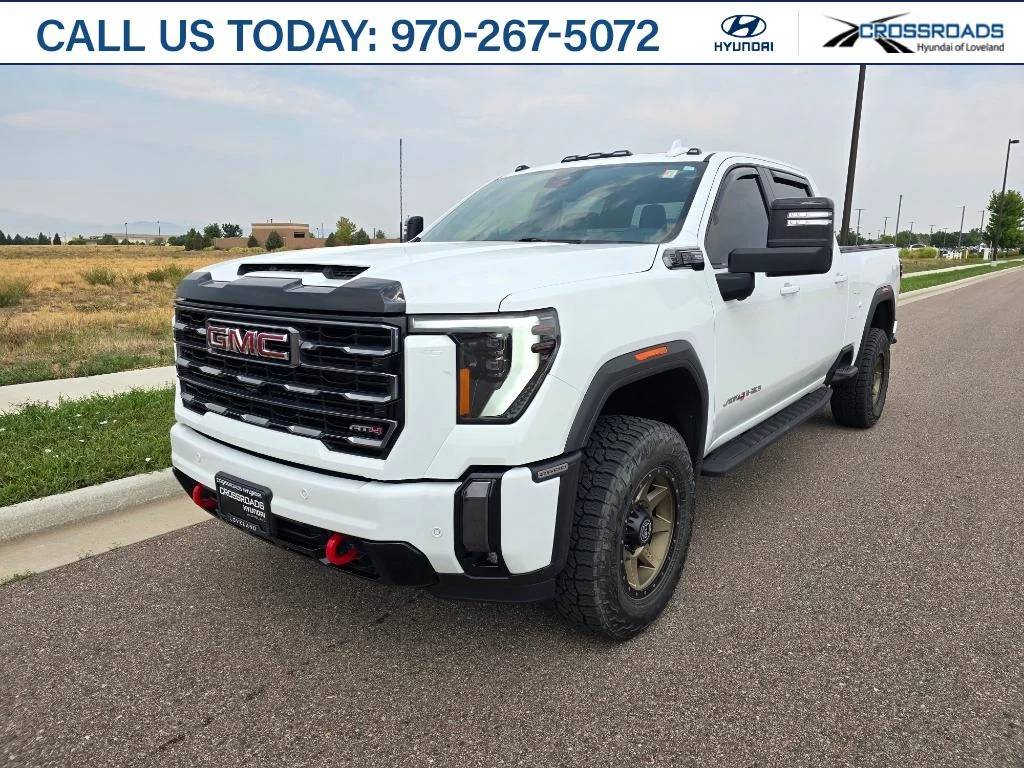 Used 2024 Summit White GMC AT4 image 1