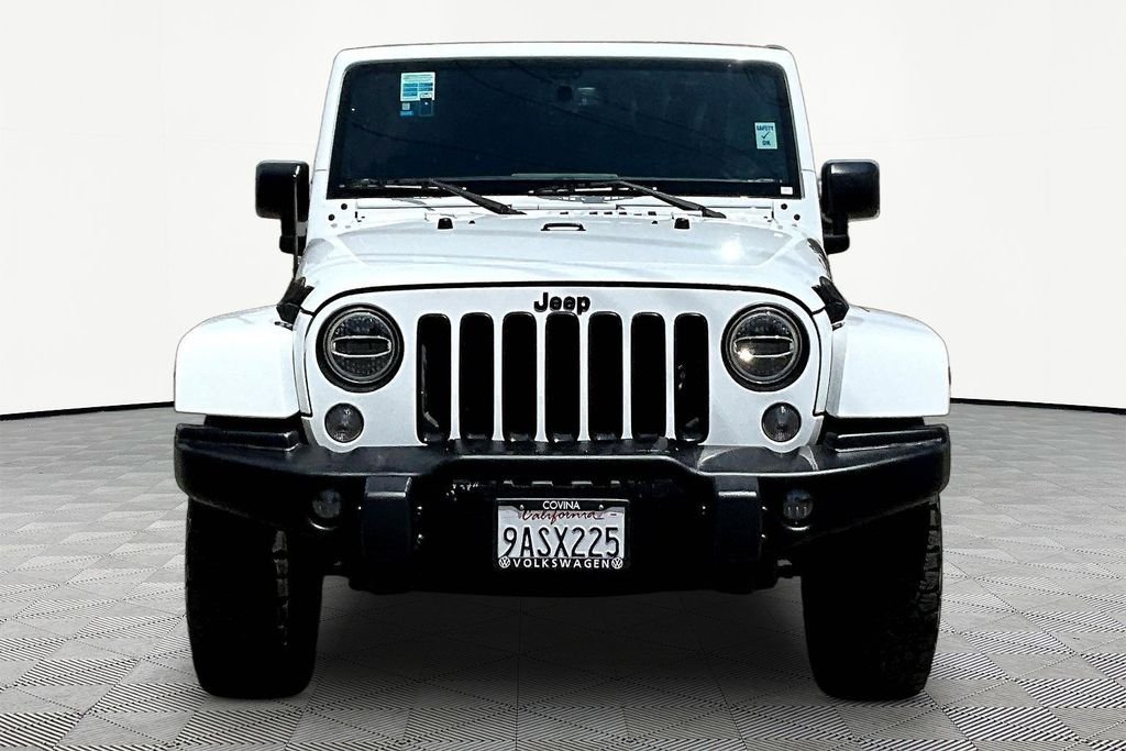 Used 2016 White Jeep Unlimited Sahara image 2