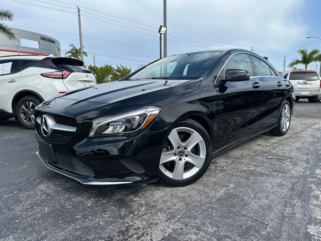 Used 2019 Black Mercedes-Benz 4MATIC® image 1