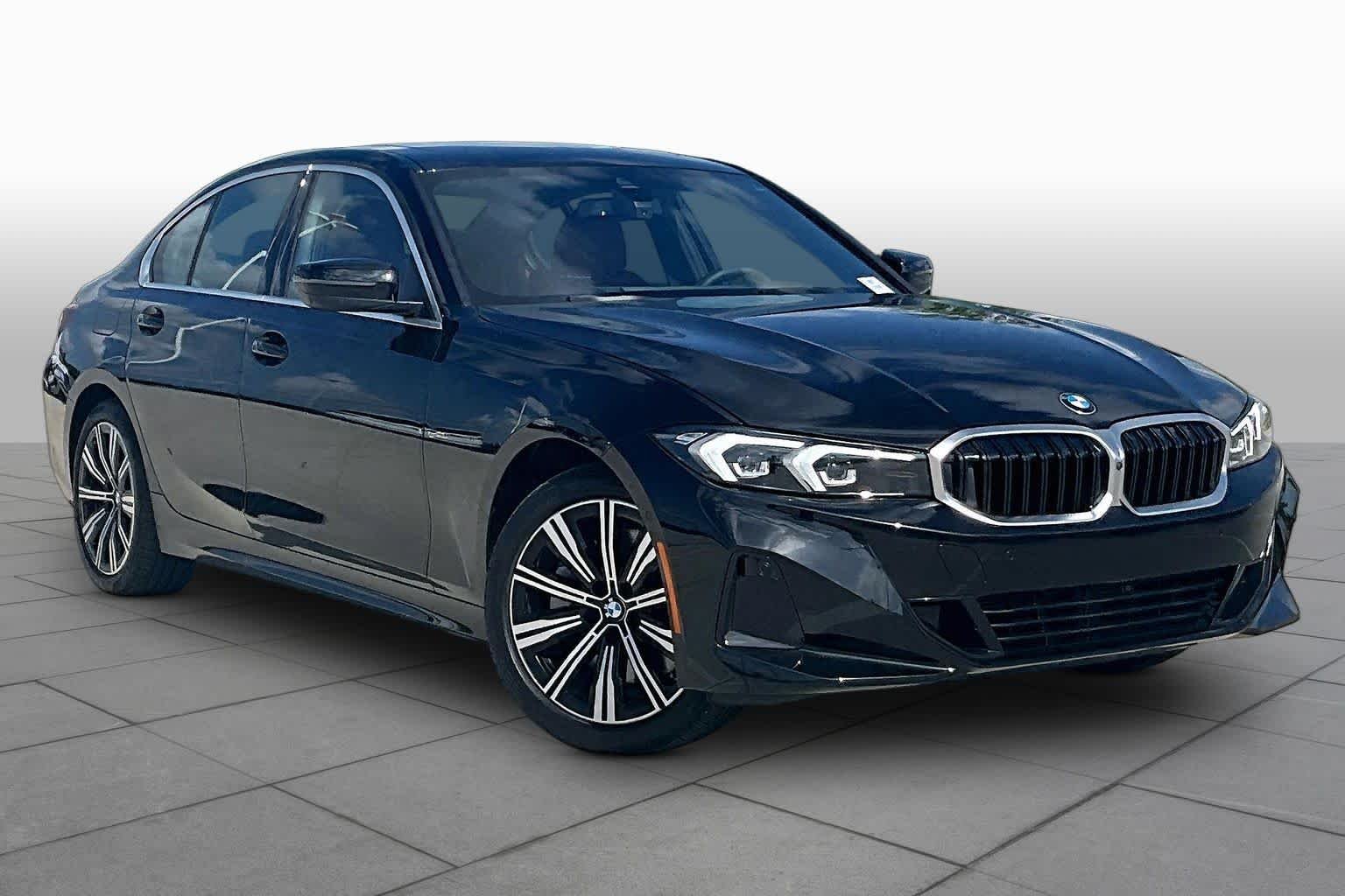 Used 2025 Black Sapphire Metallic BMW 330i image 2