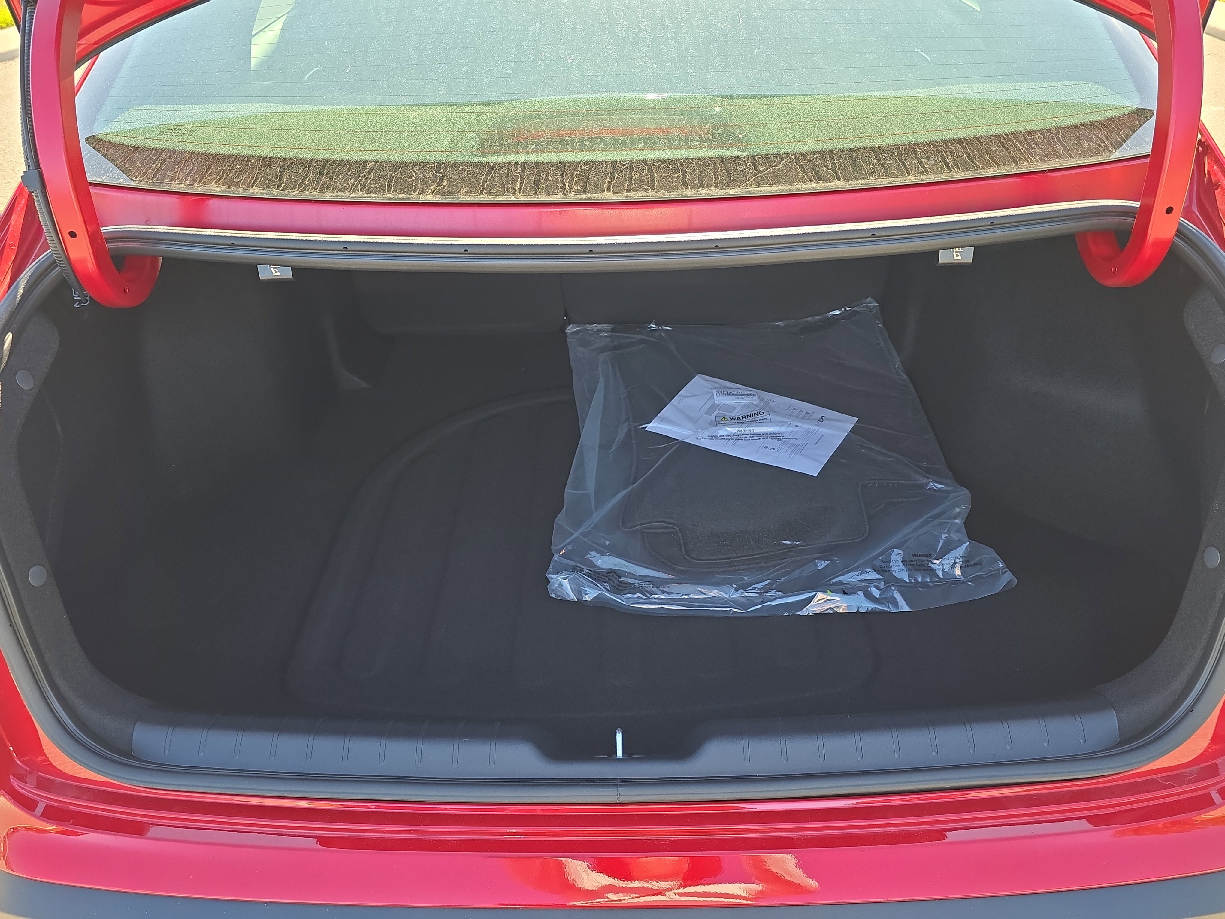 New 2026 Currant Red Kia LXS image 9