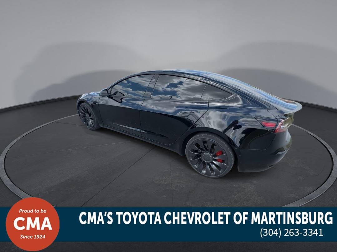 Used 2022 Solid Black Tesla Performance image 6