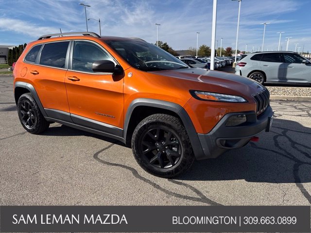 Used 2016 Orange Jeep Trailhawk image 1