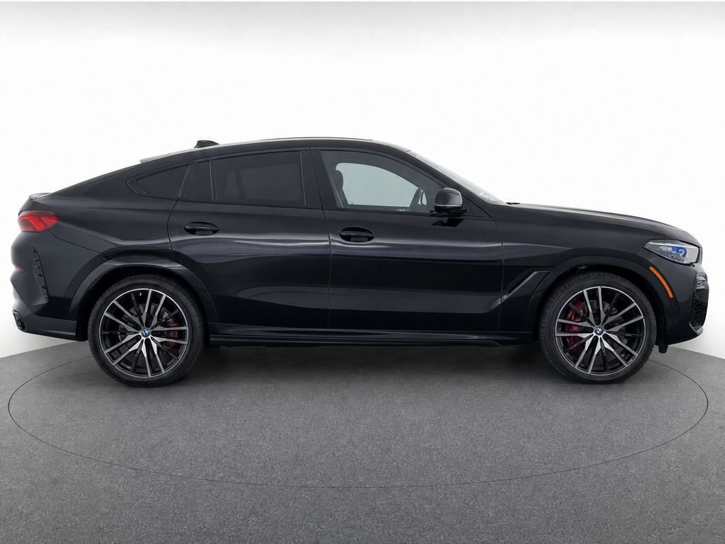 Certified Used 2023 Black Sapphire Metallic BMW xDrive40i image 2