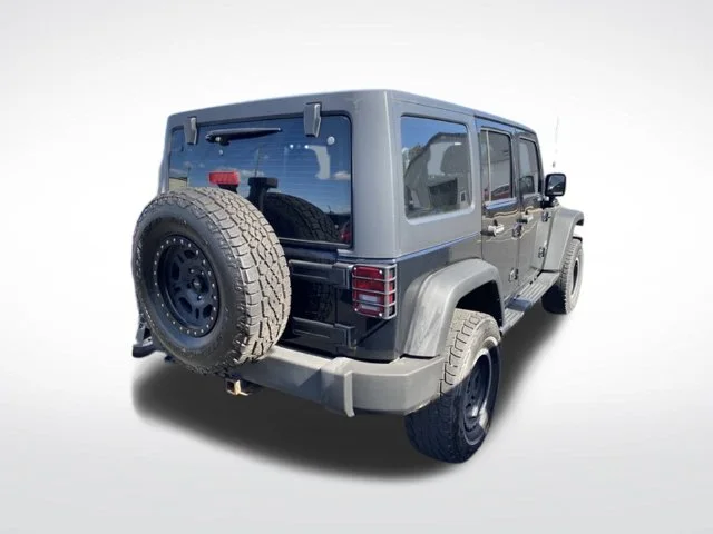 Used 2013 Jeep Wrangler Unlimited Sport with VIN 1C4BJWDG8DL634242 for sale in Alliance, OH