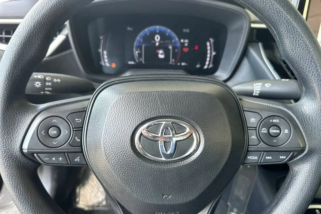 Used 2026 Classic Silver Metallic Toyota LE image 24