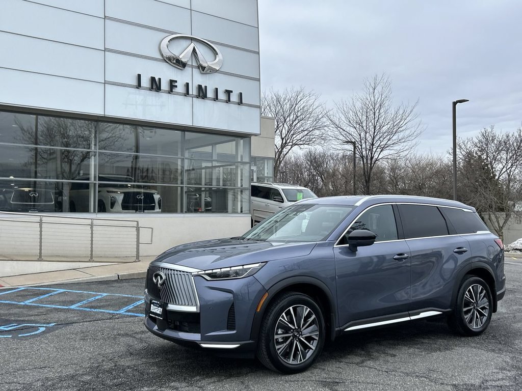 Certified Used 2026 Blue INFINITI LUXE image 1