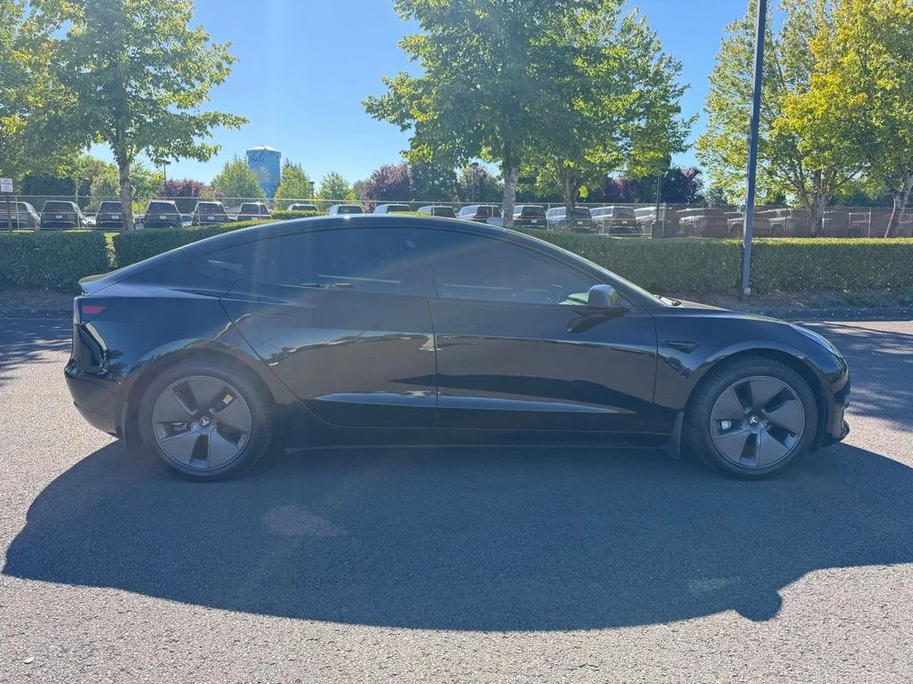 Used 2021 Solid Black Tesla Standard Range Plus image 8