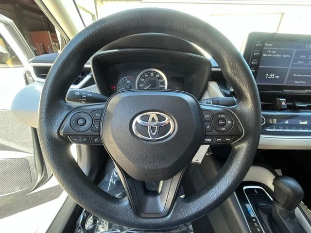Used 2021 Super White Toyota LE image 27