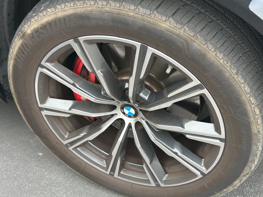Certified Used 2024 Black Sapphire Metallic BMW xDrive40i image 2