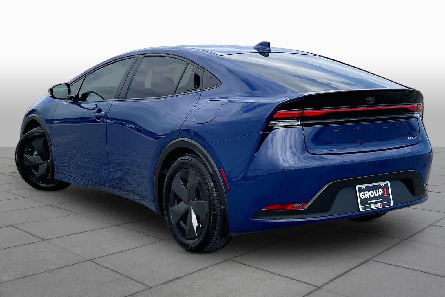 Used 2025 Reservoir Blue Toyota LE image 12