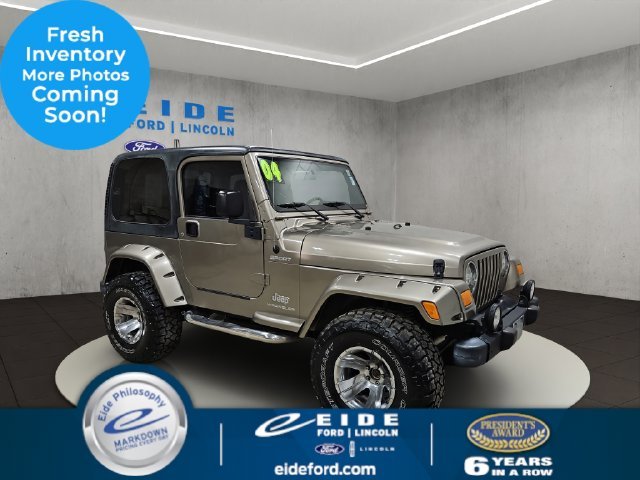 Used 2004 Beige Jeep Sport image 1