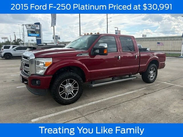 Used 2015 Ruby Red Metallic Tinted Clearcoat Ford Platinum image 1