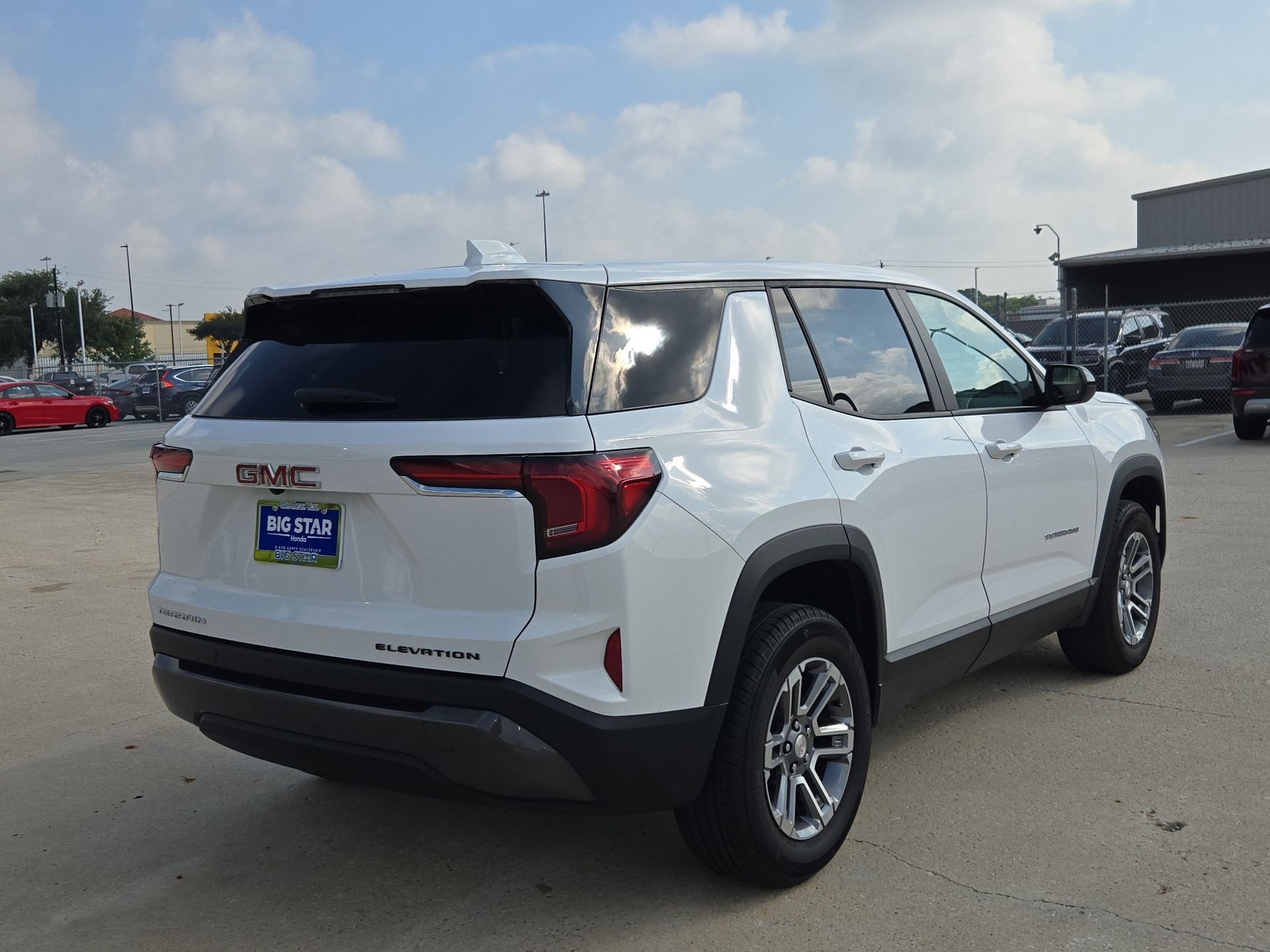 Used 2026 Summit White GMC FWD Elevation image 3