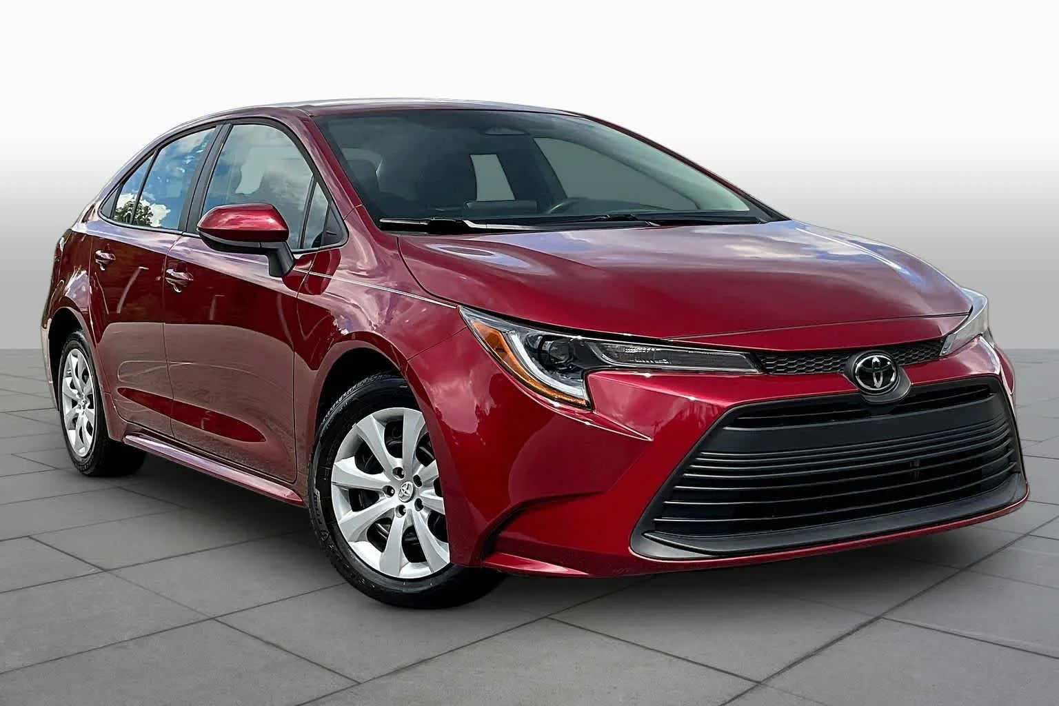 Used 2023 Ruby Flare Pearl Toyota LE image 3