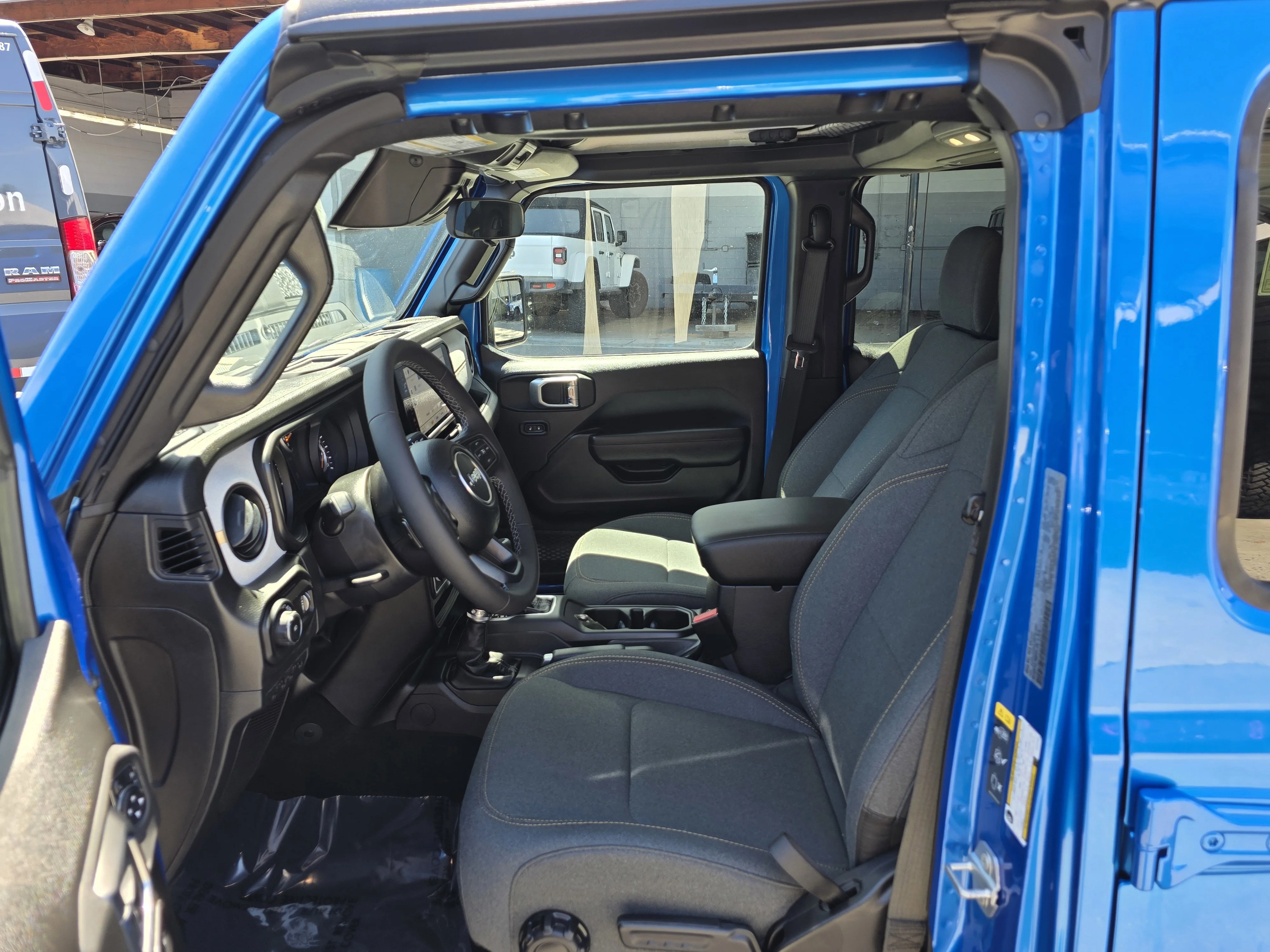 New 2026 Blue Pearl Jeep Sport S image 12