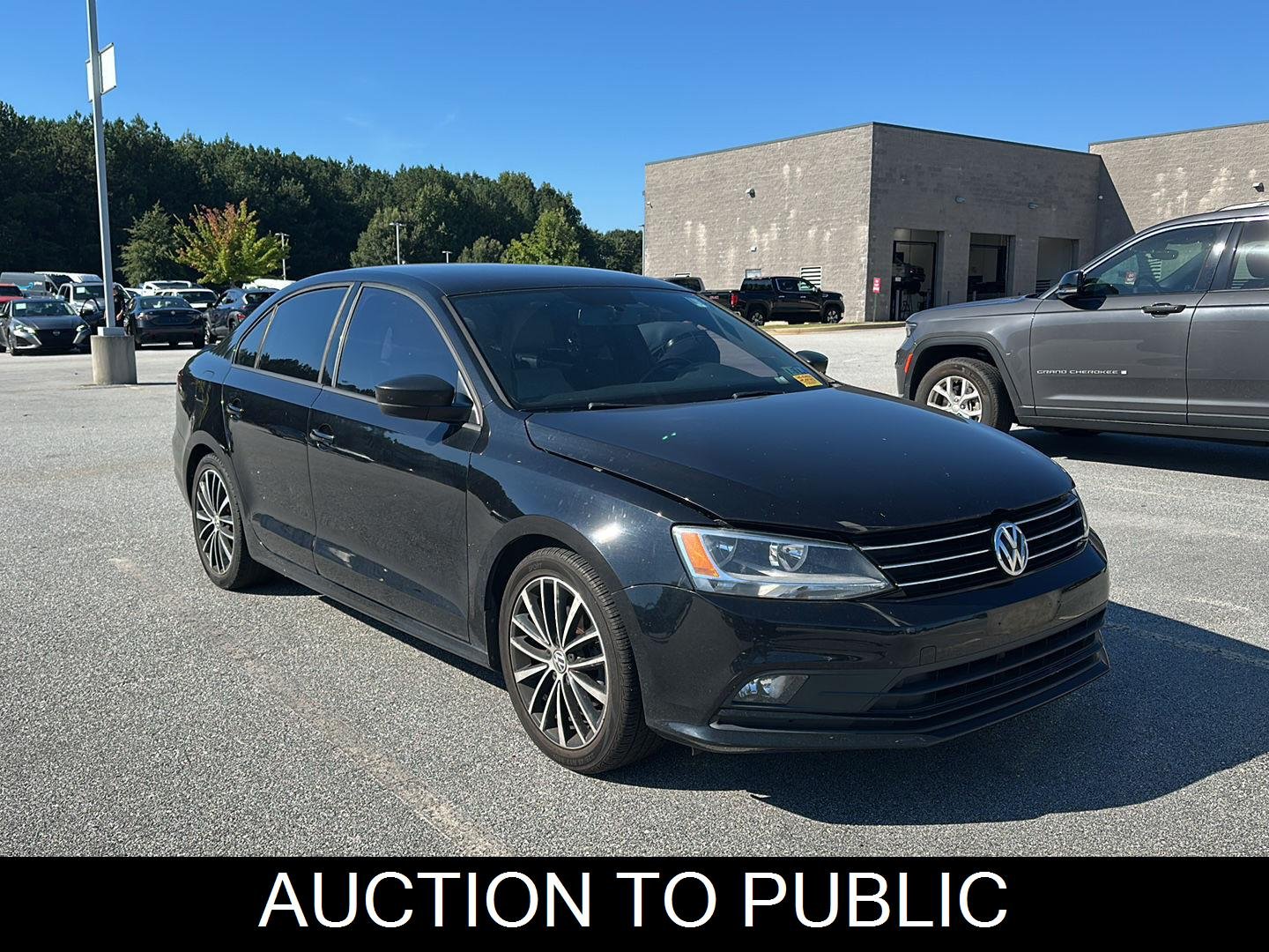 Used 2016 Black Uni Volkswagen 1.8T Sport image 1