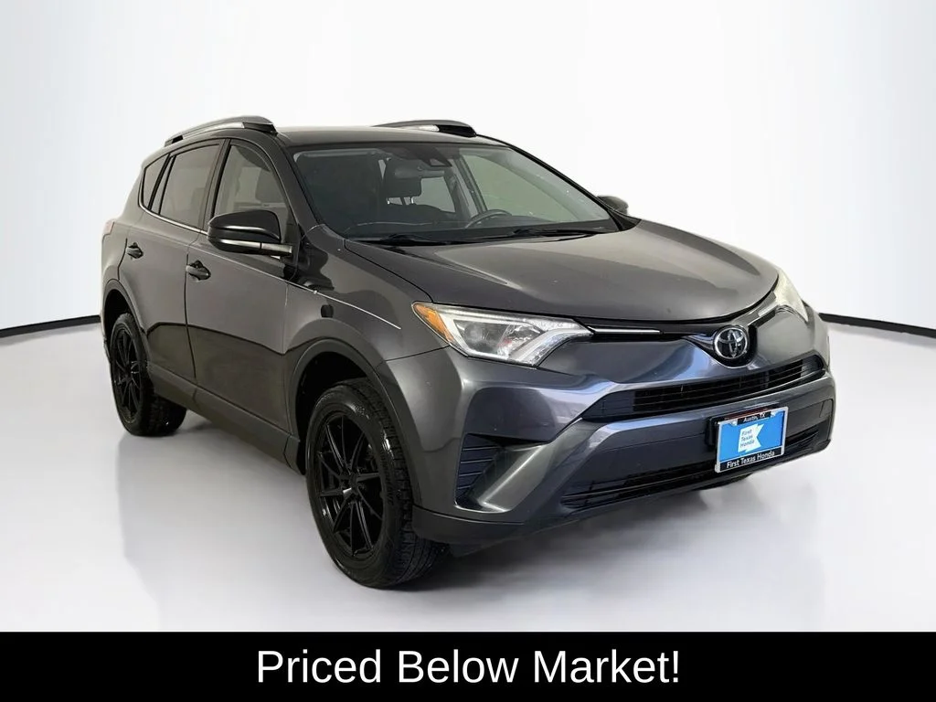 Used 2018 Magnetic Gray Metallic Toyota LE image 1