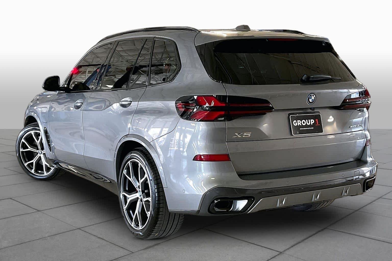 Used 2025 Skyscraper Grey Metallic BMW xDrive50e image 11