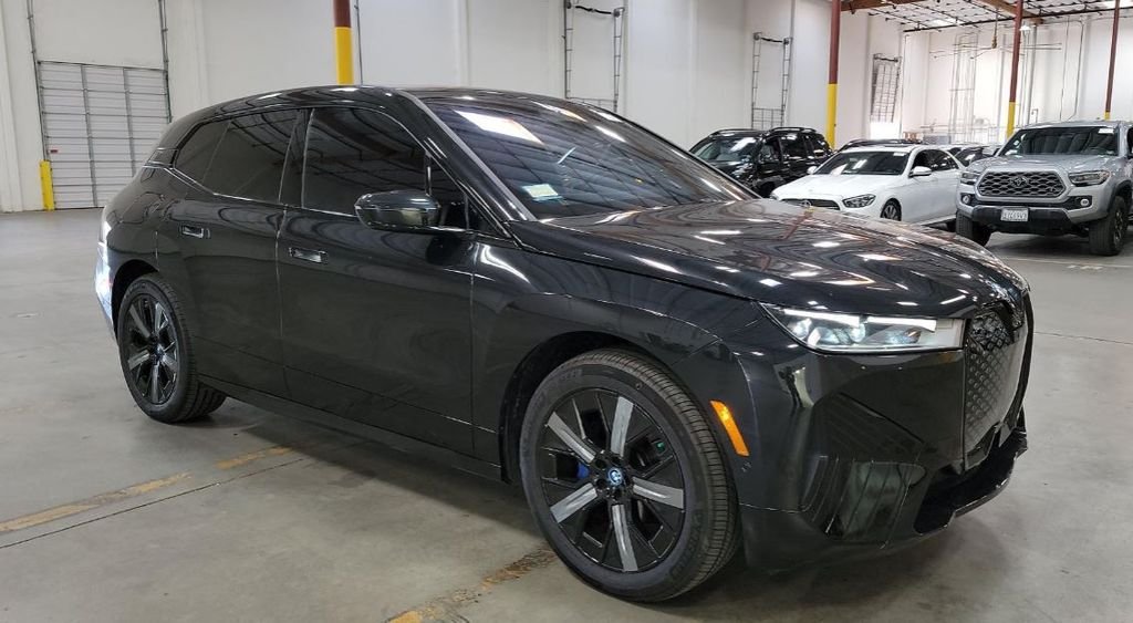 Used 2024 BMW iX Base with VIN WB523CF08RCR07563 for sale in Kansas City, KS