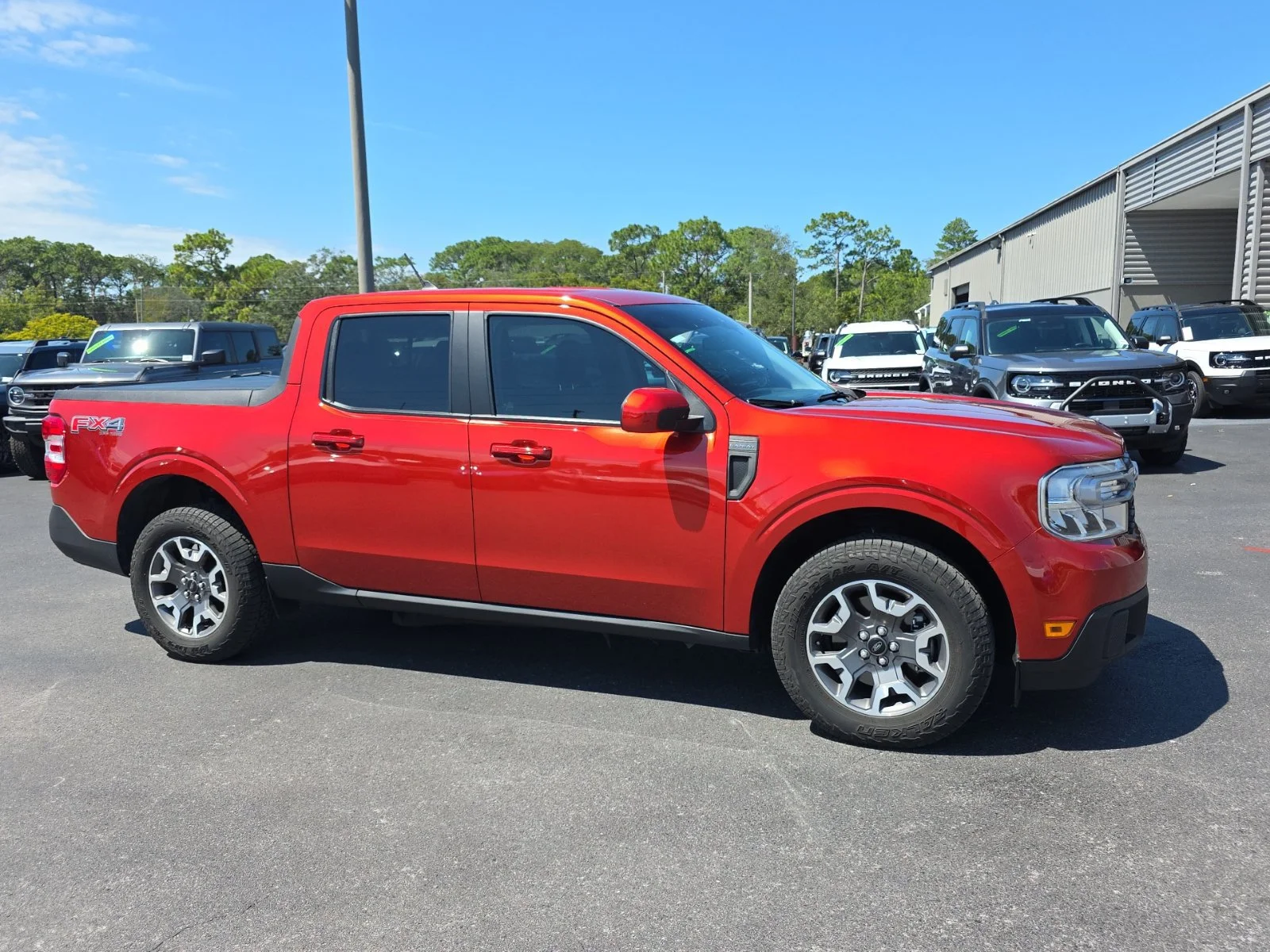 Used 2023 Red Ford Lariat image 1
