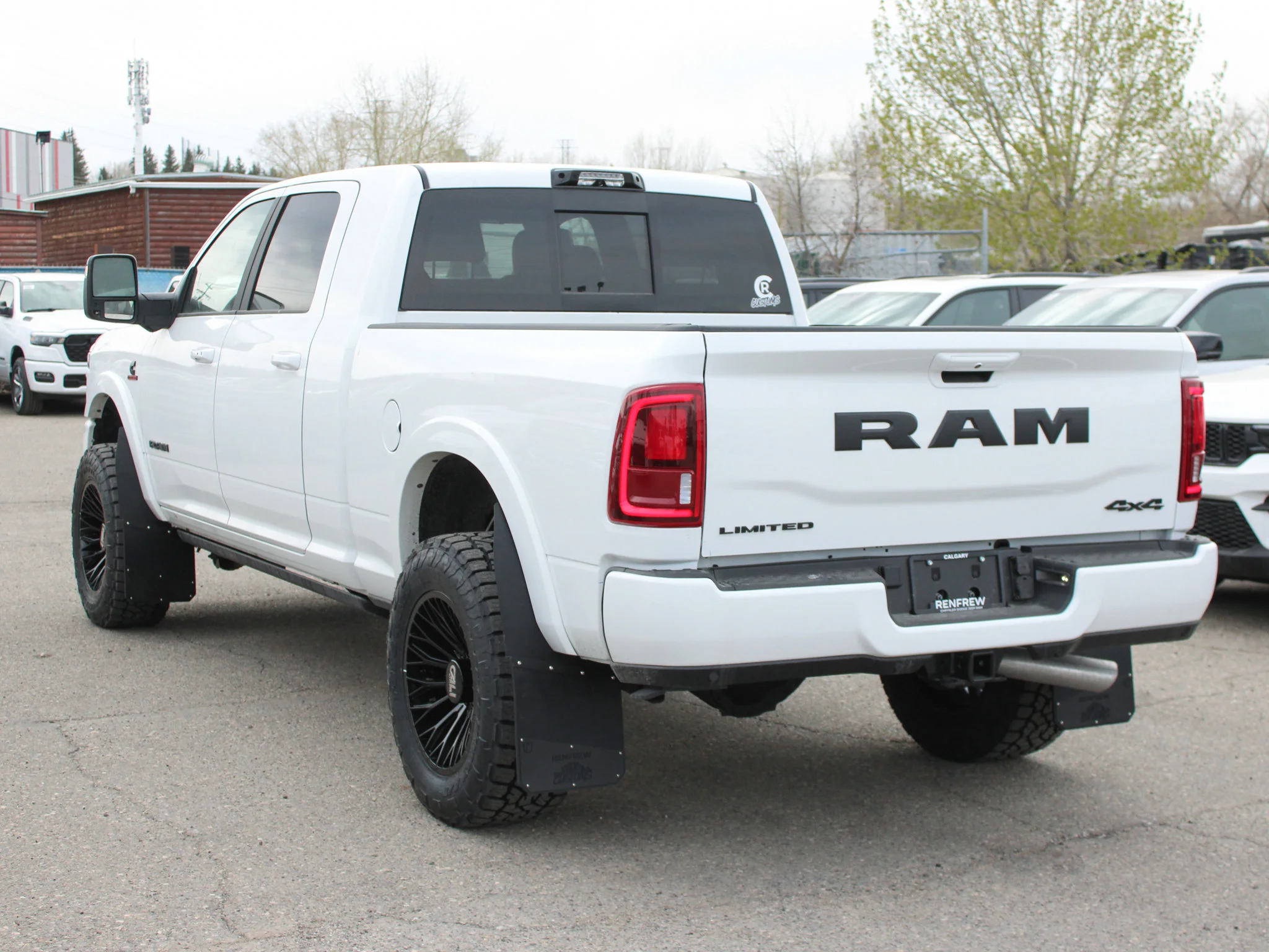 New 2026 White RAM Limited* Mega Cab, 2 Inch Lift, 35 Inch Tires, Trigger Industries Mudflaps image 4