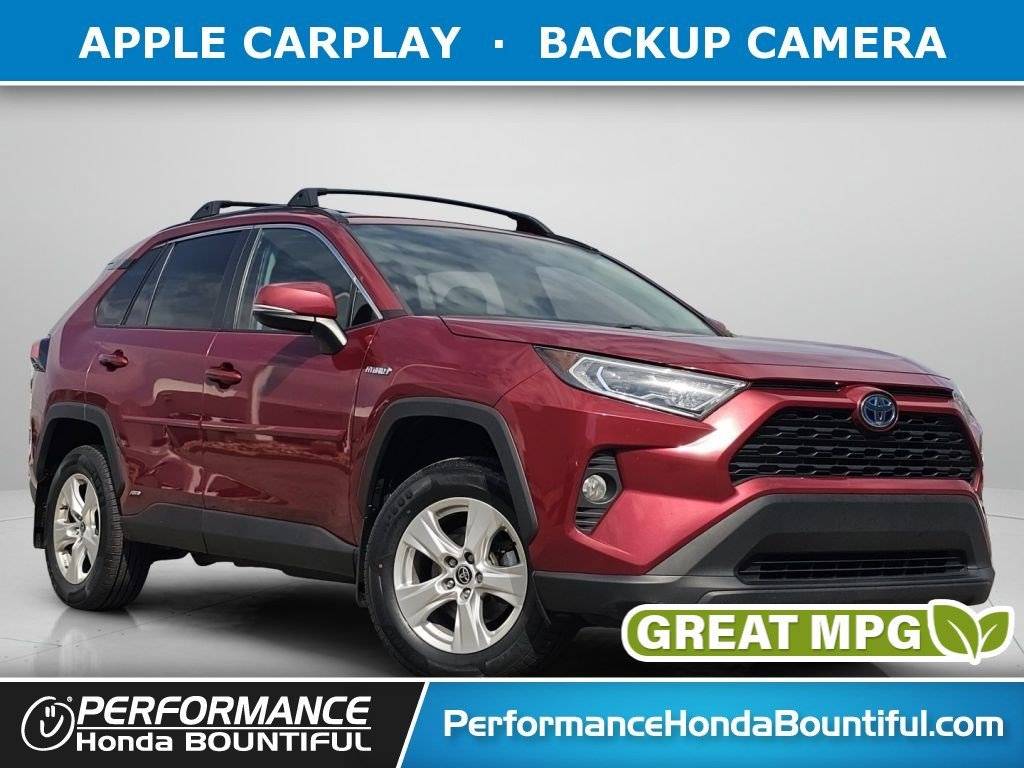 Used 2021 Pearl Toyota Hybrid XLE image 1