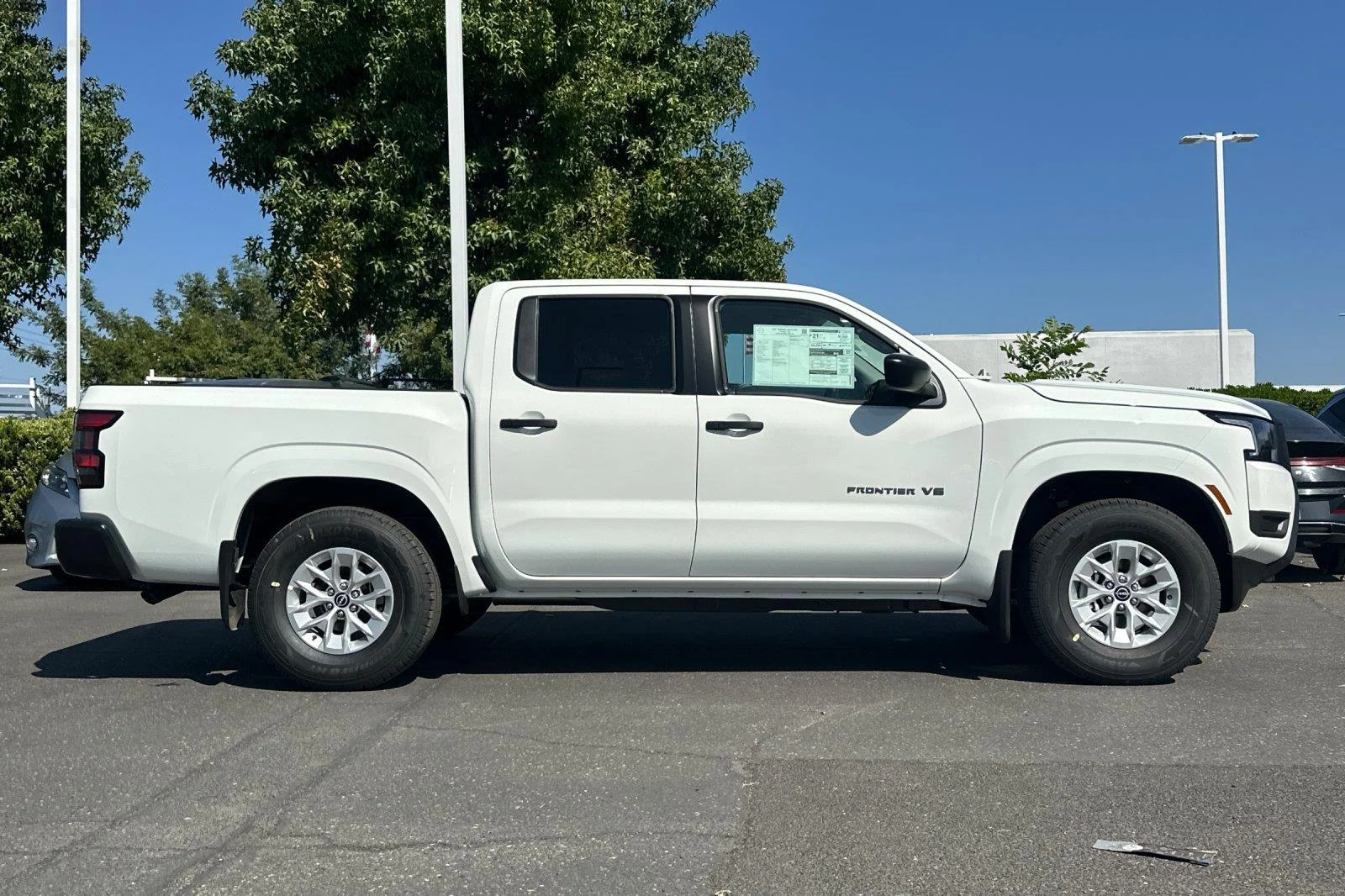 New 2027 Glacier White Nissan Crew Cab S image 2