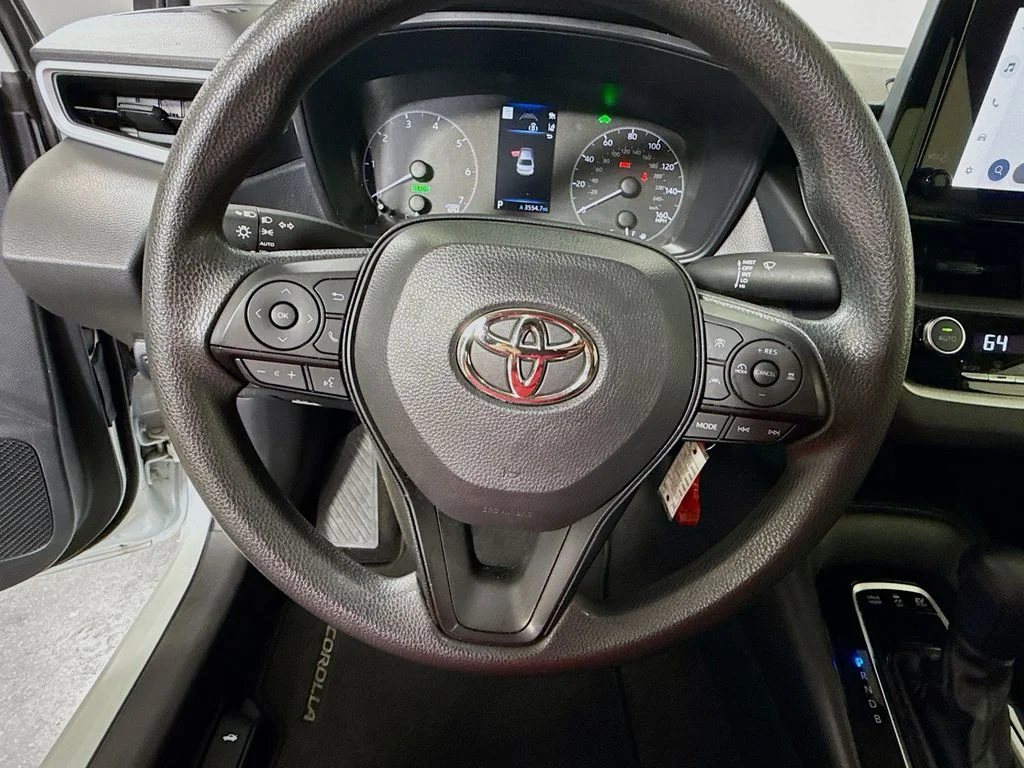 Used 2024 Wind Chill Pearl Toyota Hybrid LE image 11