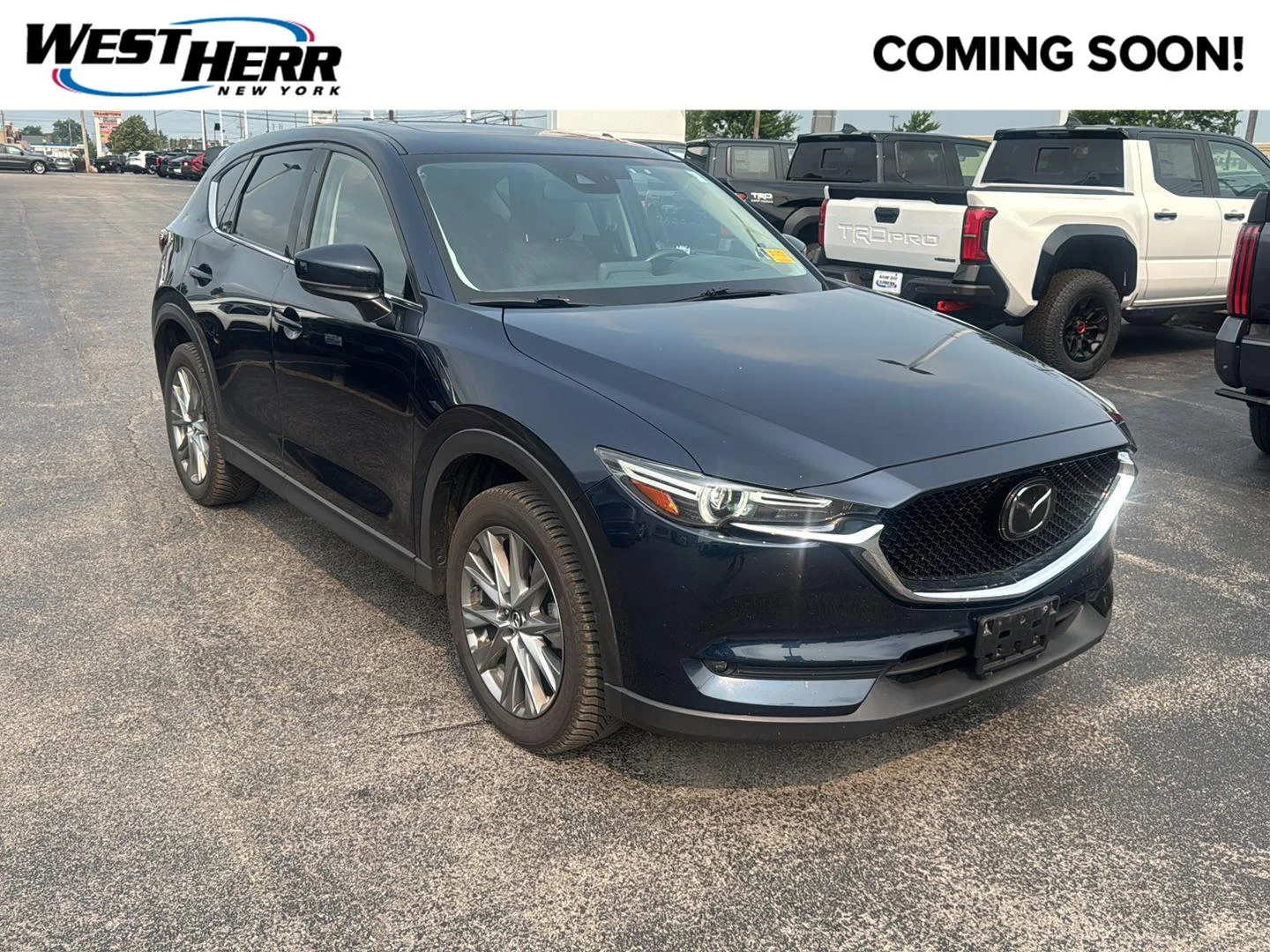 Used 2020 Deep Crystal Blue Mica Mazda Grand Touring image 1