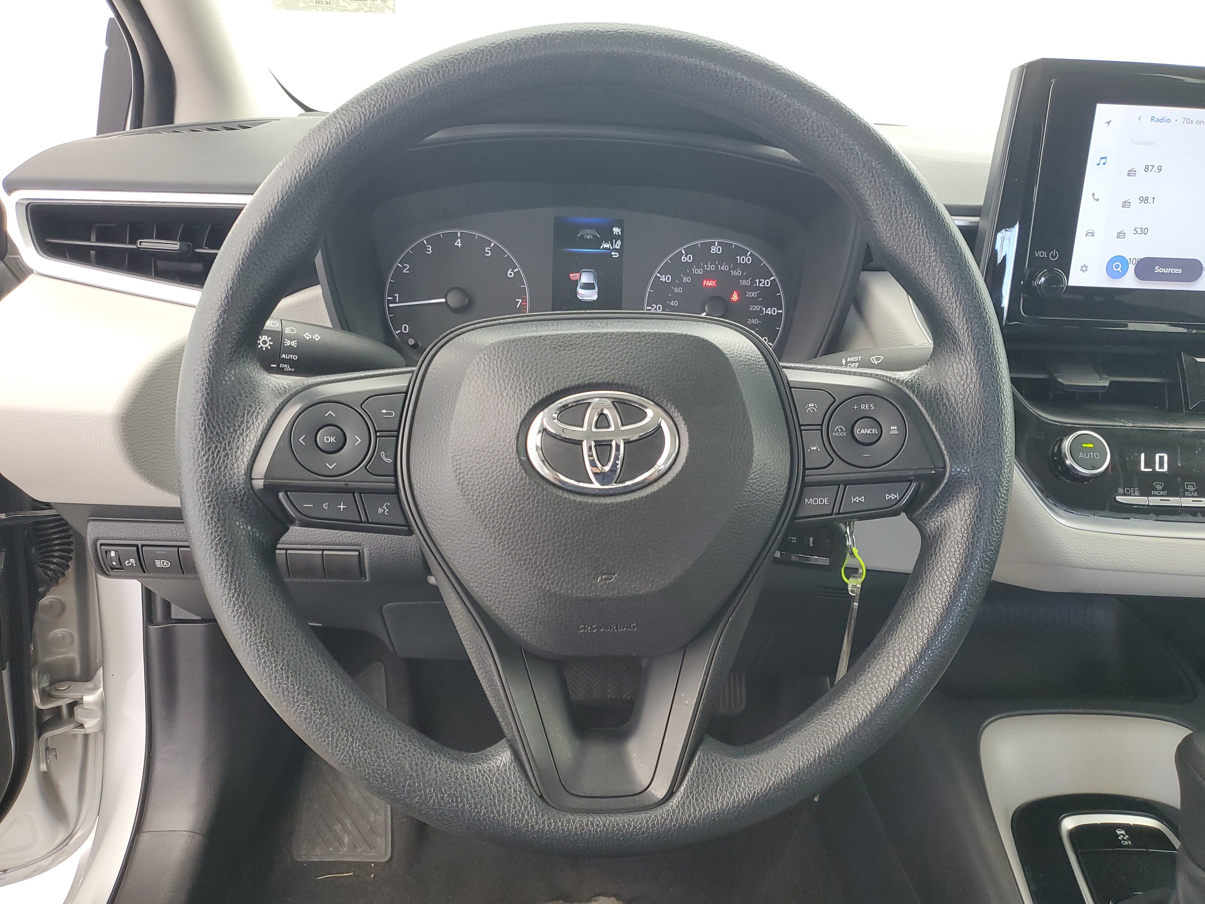Used 2024 Classic Silver Metallic Toyota LE image 22
