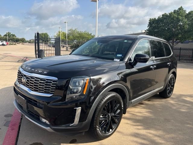 Used 2021 Black Kia SX image 1