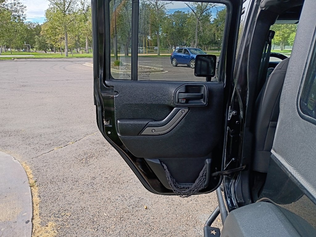 Used 2016 Black Clearcoat Jeep Sport image 17