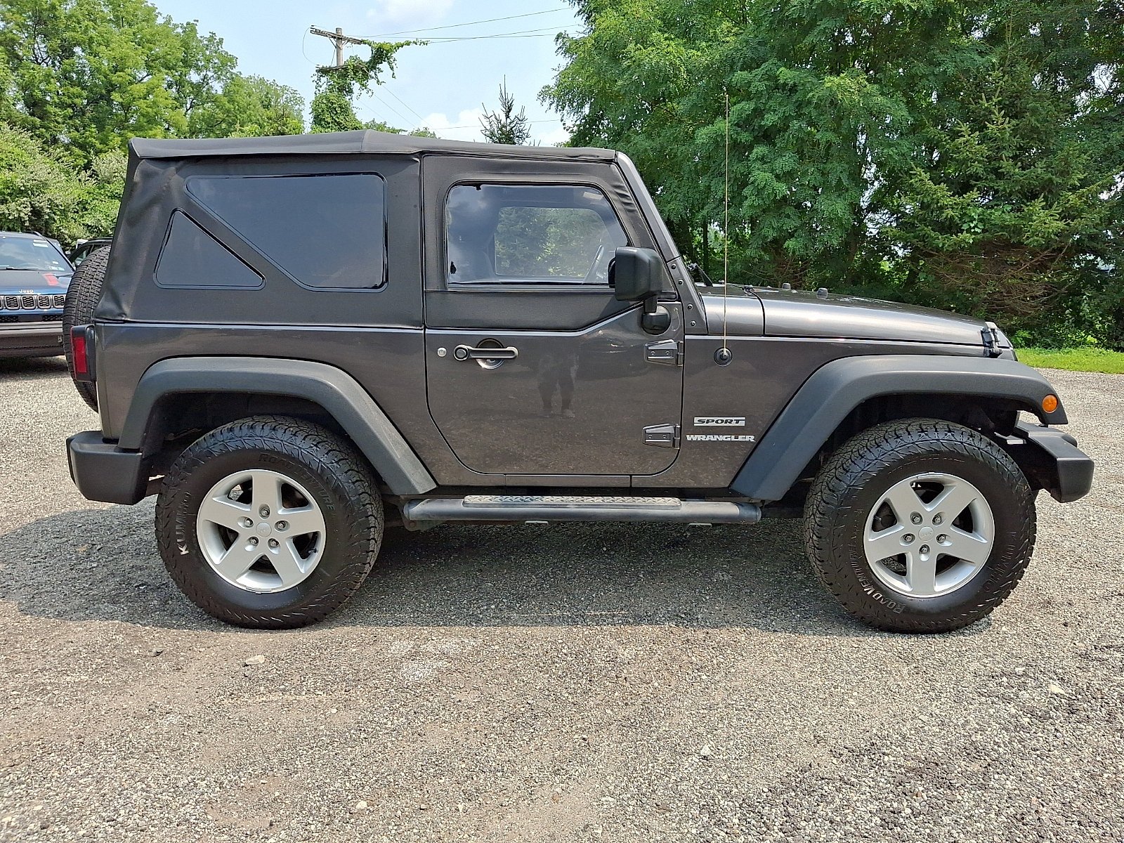 Used 2016 Granite Crystal Metallic Clearcoat Jeep Sport image 7