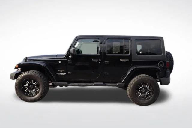 Used 2017 Black Jeep Unlimited Sahara image 7