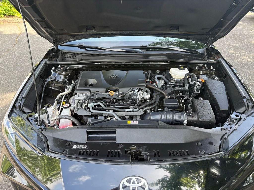 Used 2025 Midnight Black Metallic Toyota LE image 24