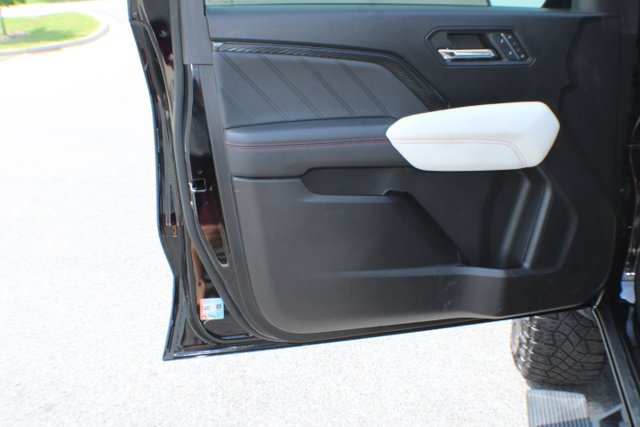 Used 2024 Onyx Black GMC 4WD AT4X image 6
