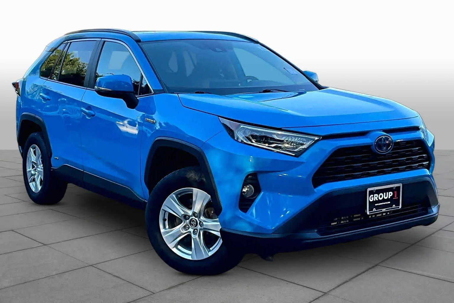 Used 2021 Blue Flame Toyota Hybrid XLE image 3