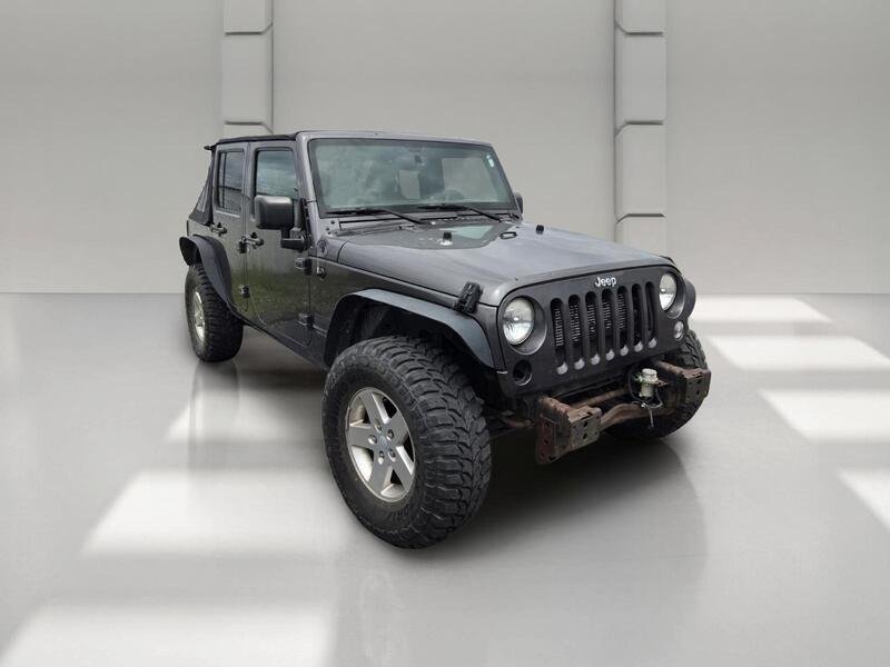 Used 2016 Crystal Metallic JEEP UNLIMITED SPORT image 3
