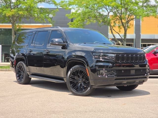 Used 2025 Diamond Black Crystal Pearlcoat Jeep Series II image 2