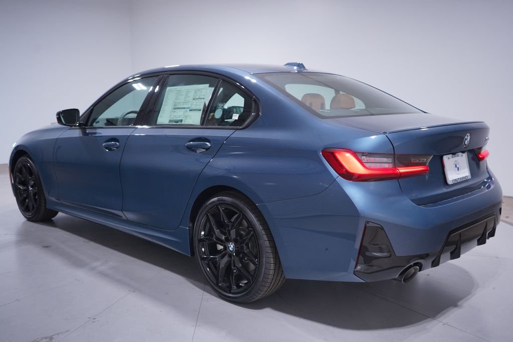 New 2026 Blue Metallic BMW 330i image 3