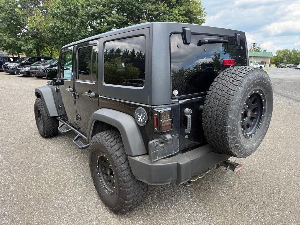 Used 2011 Black Jeep Unlimited Sport image 5