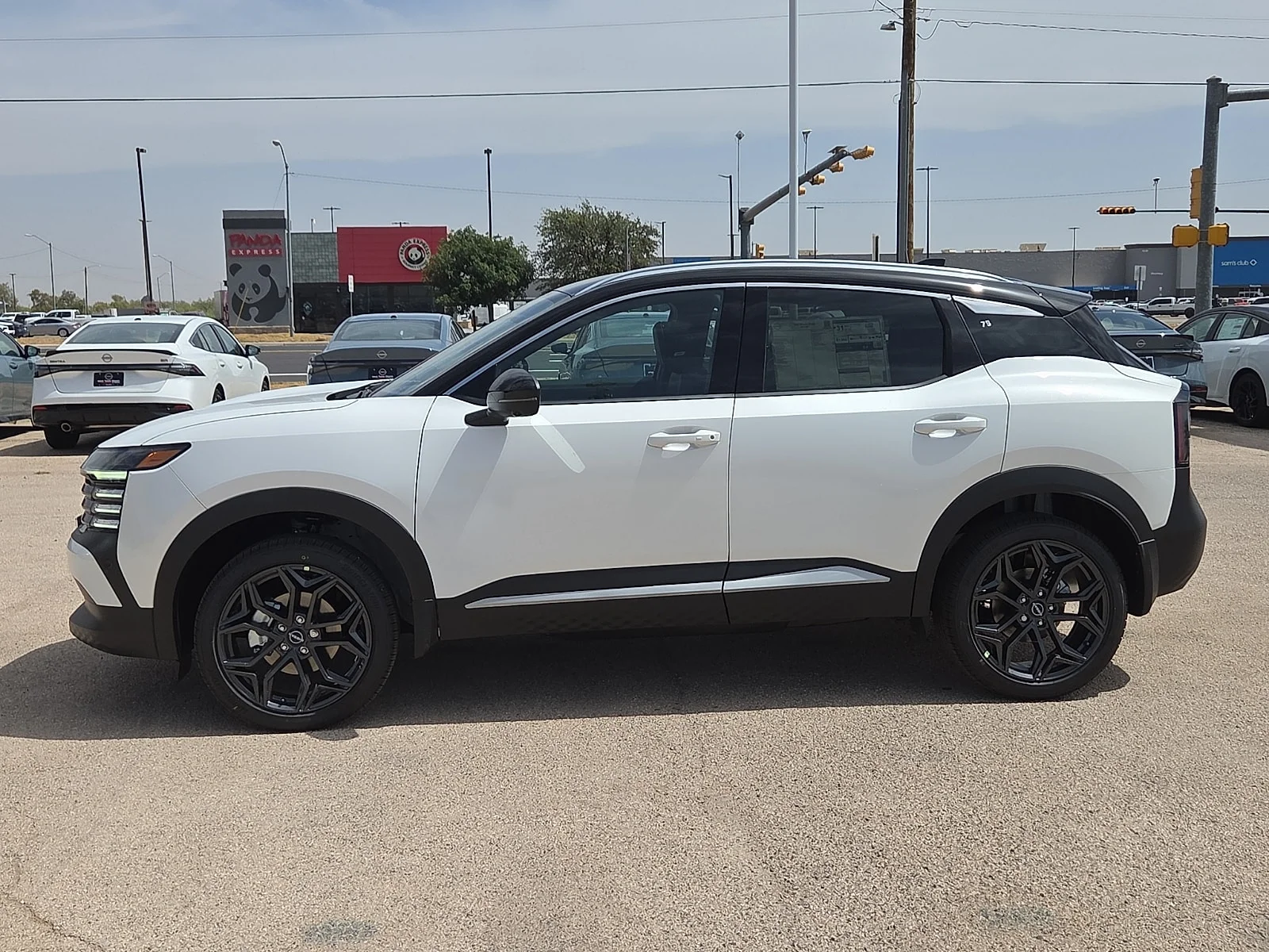 New 2027 XAB 2T White Black Nissan SR Front-Wheel Drive image 2
