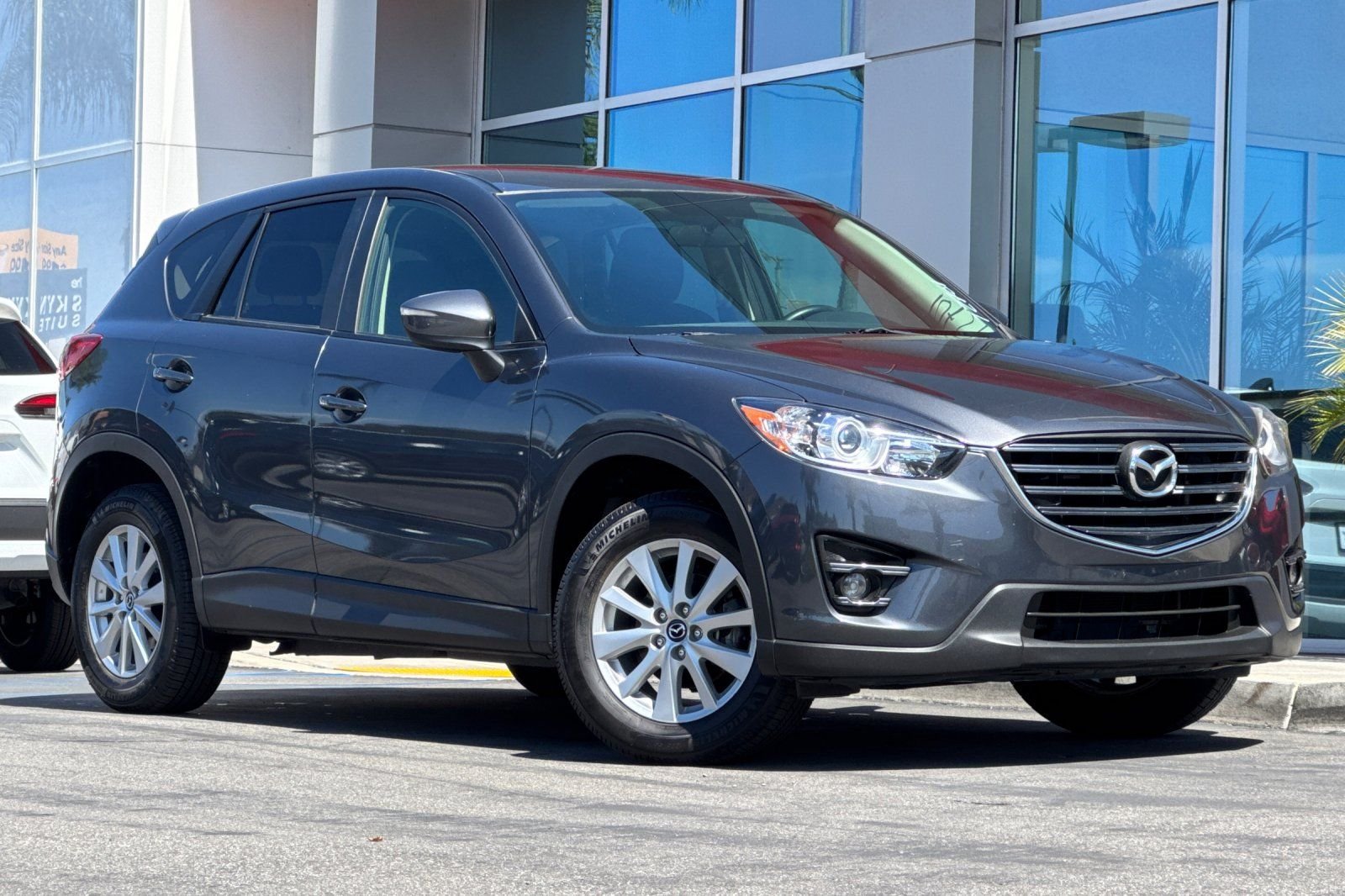 Used 2016 Mazda CX-5 Touring with VIN JM3KE2CY9G0870127 for sale in Whittier, CA