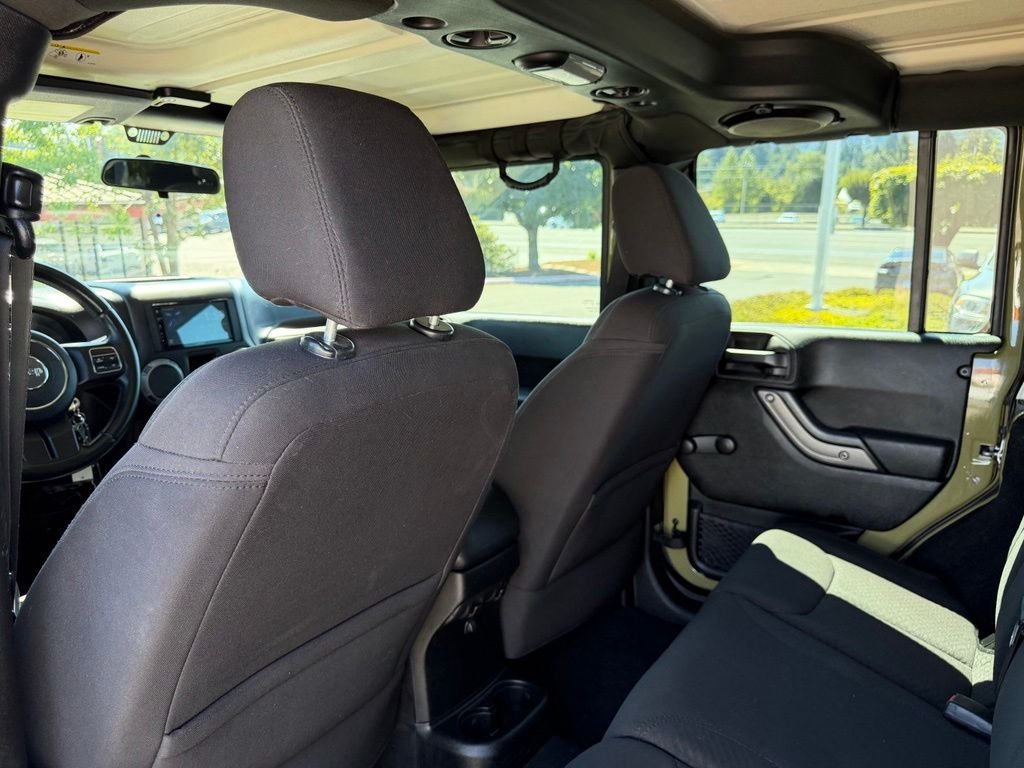 Used 2013 Commando Green Jeep Unlimited Sport image 28