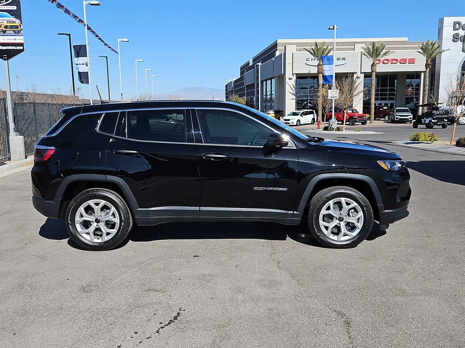Used 2025 Diamond Black Crystal Pearlcoat Jeep Sport image 9