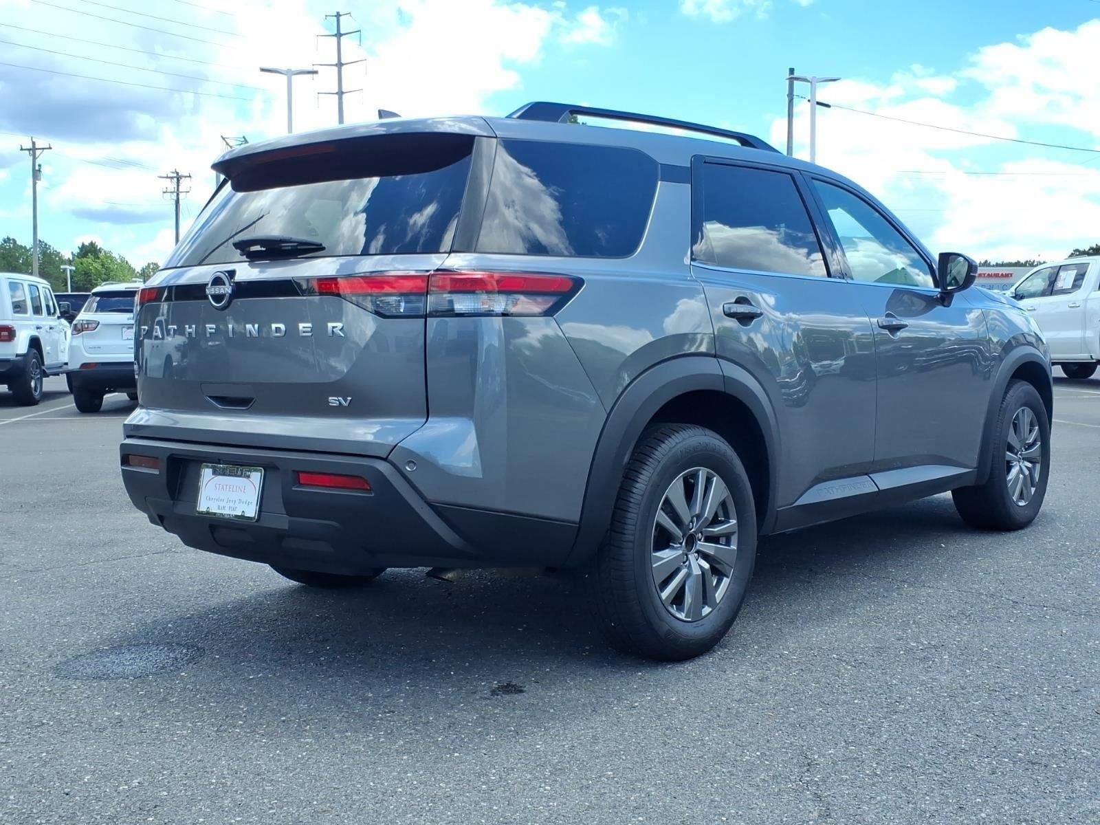 Used 2024 Gun Metallic Nissan SV image 2