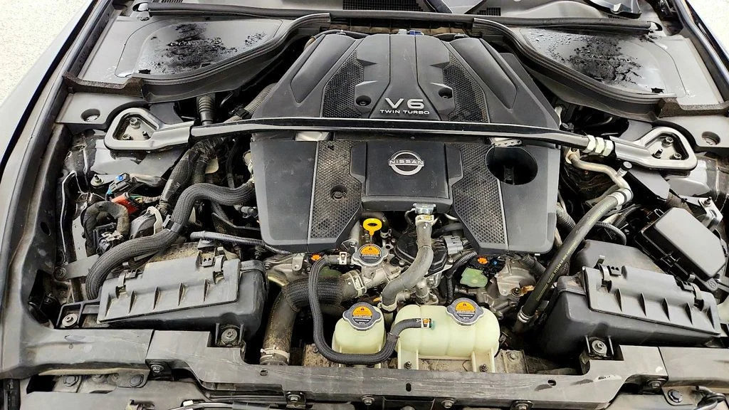 Used 2024 Black Diamond Pearl Nissan Performance Automatic image 24