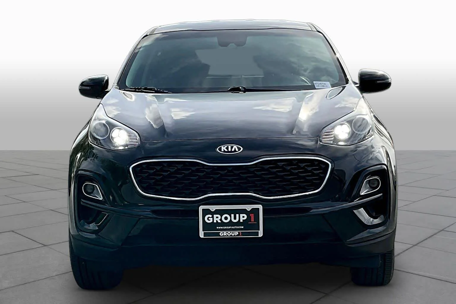 Used 2022 Black Cherry Kia LX image 6