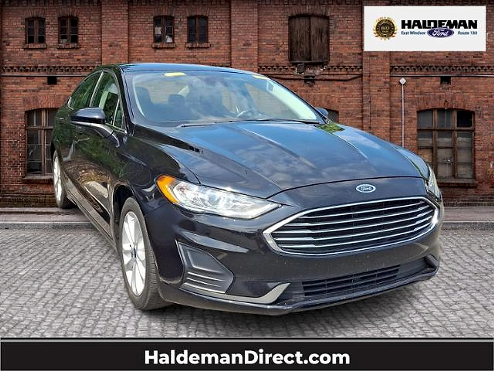 Used 2020 Agate Black Metallic Ford Hybrid SE image 1
